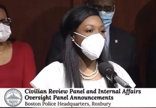 8D0D287A-5A7E-4FA3-803D-7EBE8C1911CE-copy Woman in mask announces police oversight.
