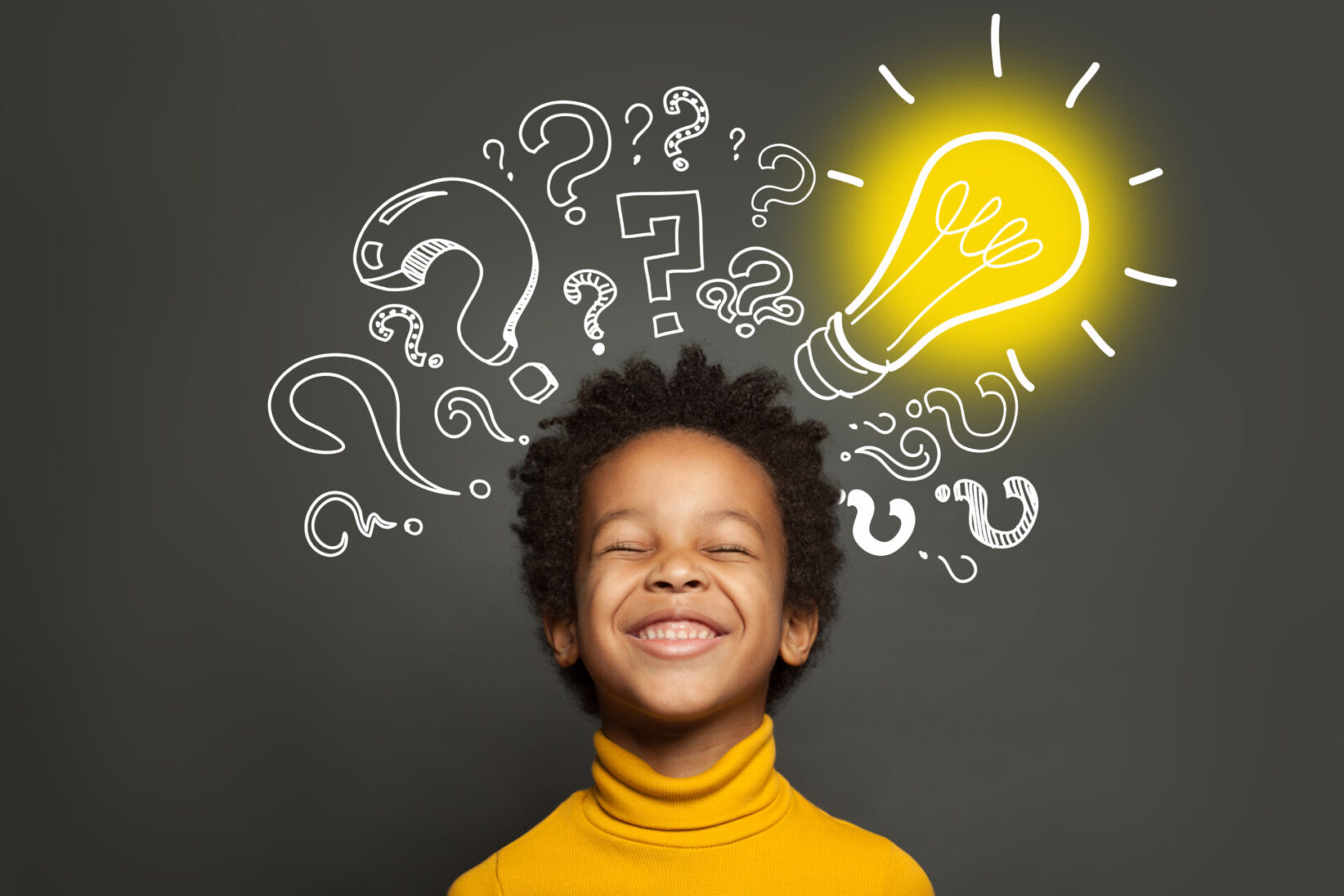 Happy black kid on black background with light bulb and question Child's bright idea, solving problems.