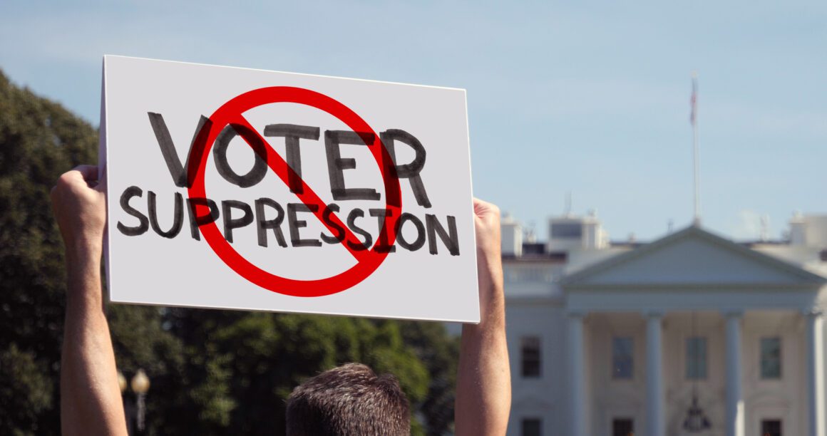 AdobeStock_437114220-1160x612 Protest sign: Stop voter suppression.