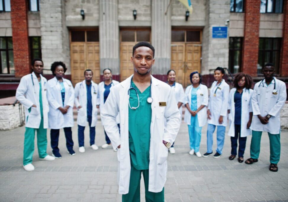 Group of african doctors students near medical university outdoor.